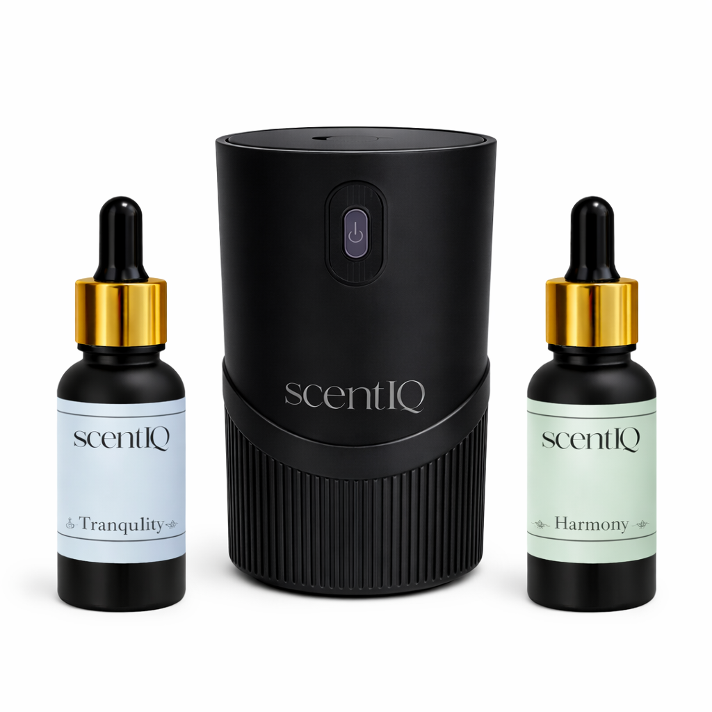 ScentIQ diffuser and bottles on a white background